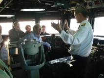 Kiama Rotary visit HMAS SYDNEY and are guided by the Commanding Officer
